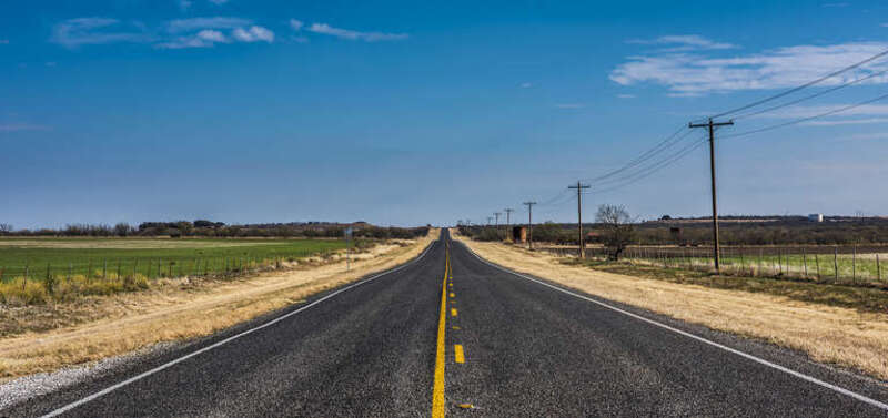 
500px provided description: Texas Country Road [#sky ,#landscape ,#road ,#grass ,#empty ,#farm ,#texas ,#flat ,#prairie ,#vanishingpoint]