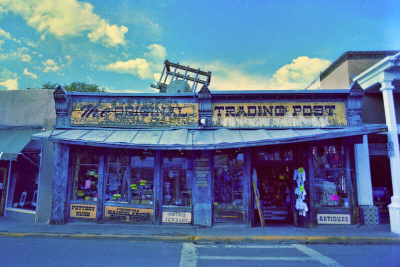This claims to be &quot;The Oldest Indian and Mexican Trading Post in the United States&quot;
Original taken with Nikon FM2, Nikkor AF 24mm f/2.8D, Fujicolor Superia Reala 100

Digitized with a Nikon D90, Micro-Nikkor 55mm f/3.5 AI + extension tubes (32mm),