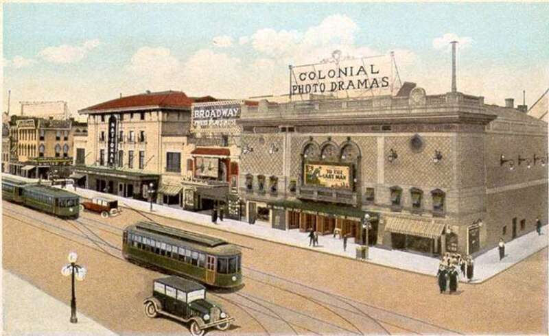 Postcard view of &quot;Theatrical District, Broad Street, Richmond, Virginia,&quot; 8th &amp;amp; Broad Streets, Richmond, Virginia. View shows street scene with at least two Cinemas and one other theater of some type visible. On street are three streetcars, two