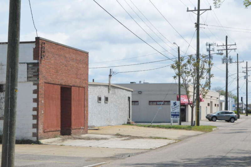 Industrial buildings on the northern side of 24th Street, looking toward the Newport Avenue intersection, in Norfolk, Virginia, United States.  This block is part of the Norfolk and Western Railroad Historic District, a historic district that is
