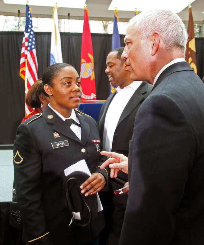 SANDY SPRINGS, Feb. 13, 2013  - Georgia Army Guard Pfc. Brittany Wynn, a wheel maintenance specialist with Marietta's 165th Quartermaster Company - and a small package sorter for UPS at its Pleasantdale Road facility - gets a word of appreciation for