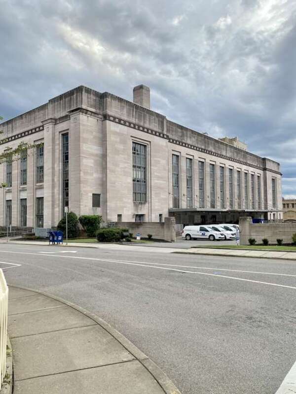 Built in 1932-34, this Art Deco, Art Moderne, and Stripped Classical Revival-style Post Office and Federal Building was designed by Baumann and Baumann to replace the earlier Old Custom House and Post Office in Downtown Knoxville on Market Street,