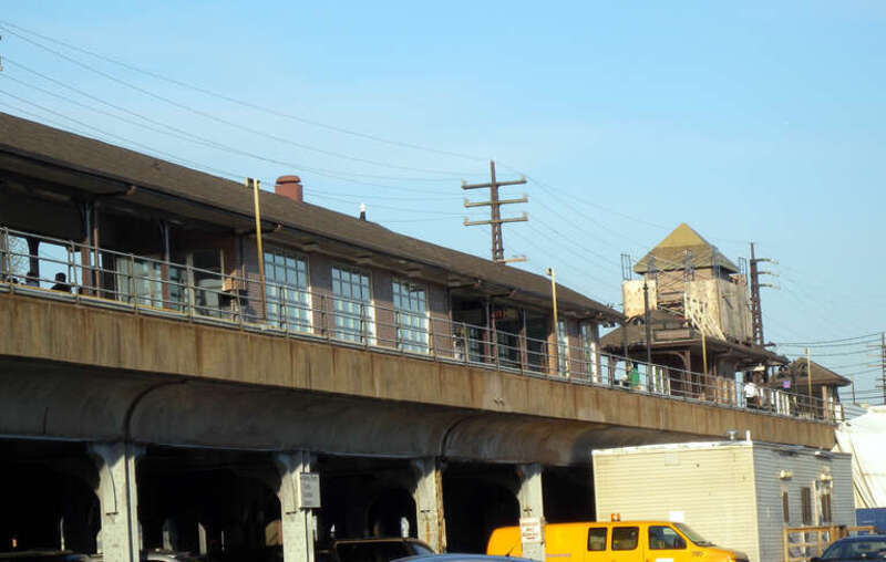 Looking northeast and up at Valley Stream station on a sunny late afternoon.