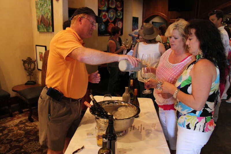 Wine Country Bistro and Bottle Shop on Line Avenue held its fourth annual &quot;Wine and Swine&quot; shindig on Sunday, April 22. As the event's name would suggest, the main attractions are wine - lots of varieties are available to sample - and pork cooked