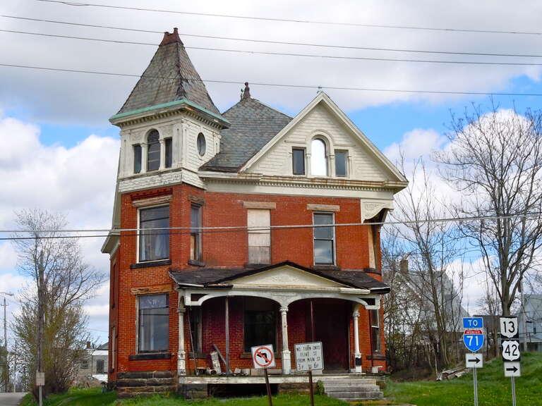 William Ritter House on the NRHP since December 29, 1978. At 181 S. Main St., Mansfield, Ohio. (Harris Street on the left, Glessner St. behind and to the right of the photographer)