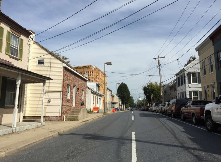 View east along Maryland State Route 144 (South Street) at Burck Street in Frederick, Frederick County, Maryland