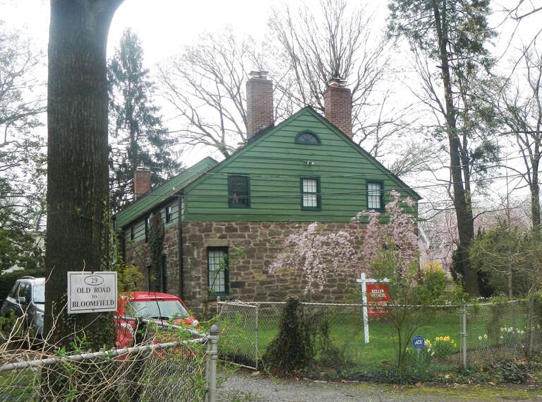 Looking east at house on a cloudy afternoon.