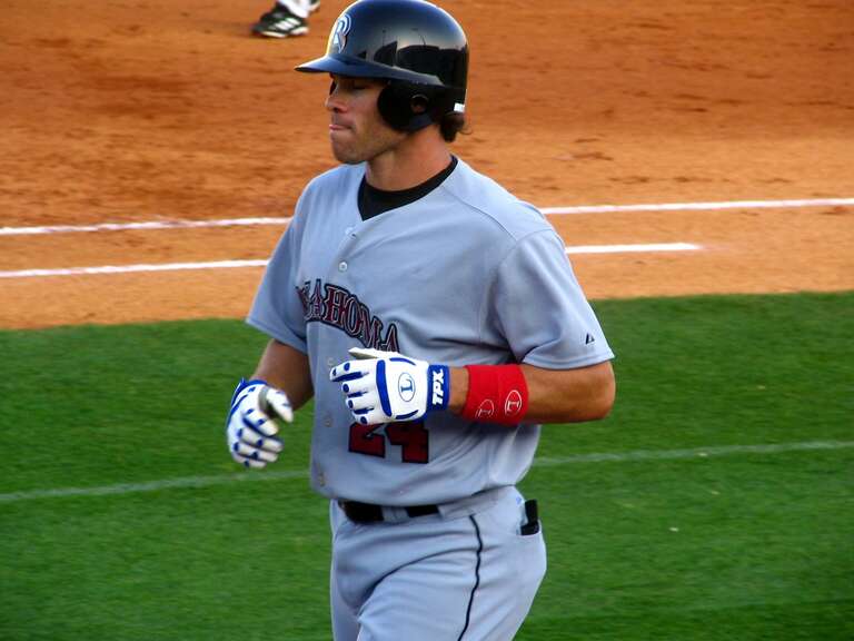 On April 21, Adam Hyzdu was promoted from AAA Oklahoma to the Texas Rangers to replace Lance Nix on the roster.  This photo was taken  4 days before his promotion, on a day that he hit 2 home runs and a walk.  He was drafted by the Giants in 1990,