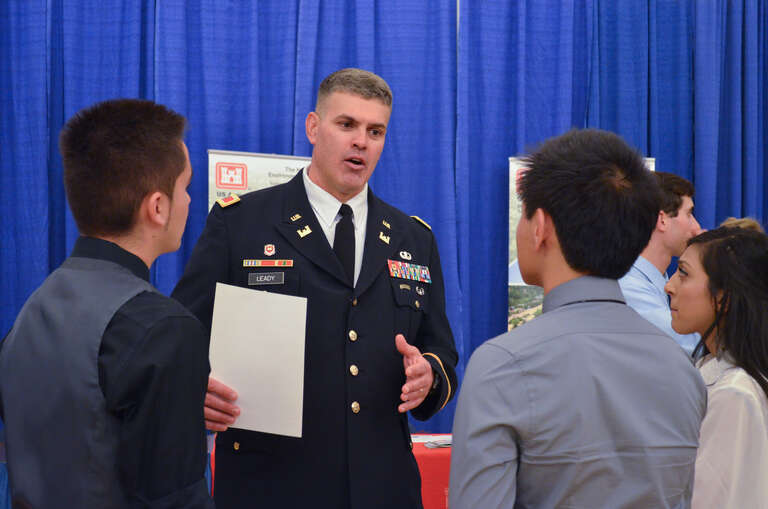 U.S. Army Corps of Engineers Sacramento District’s commander Col. Bill Leady and Linda Finley, programs and project support branch chief, speak to attendees at Night with Industry 2012, a networking event at the University of California – Davis in