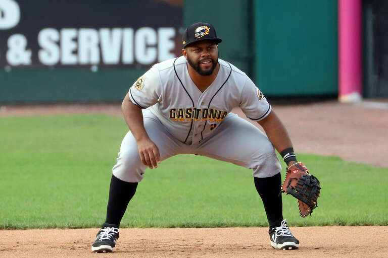 Jason Rogers playing first base for the Gastonia Honey Hunterys during a game at Clipper Magazine Stadium, Lancaster, PA, July 10, 2021.