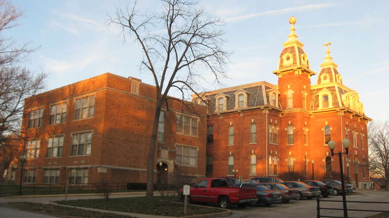 Front of the Knightstown Academy, a former Quaker school located on Carey Street in Knightstown, Indiana, United States.  Built in 1876 and since converted to apartments, it is listed on the National Register of Historic Places.