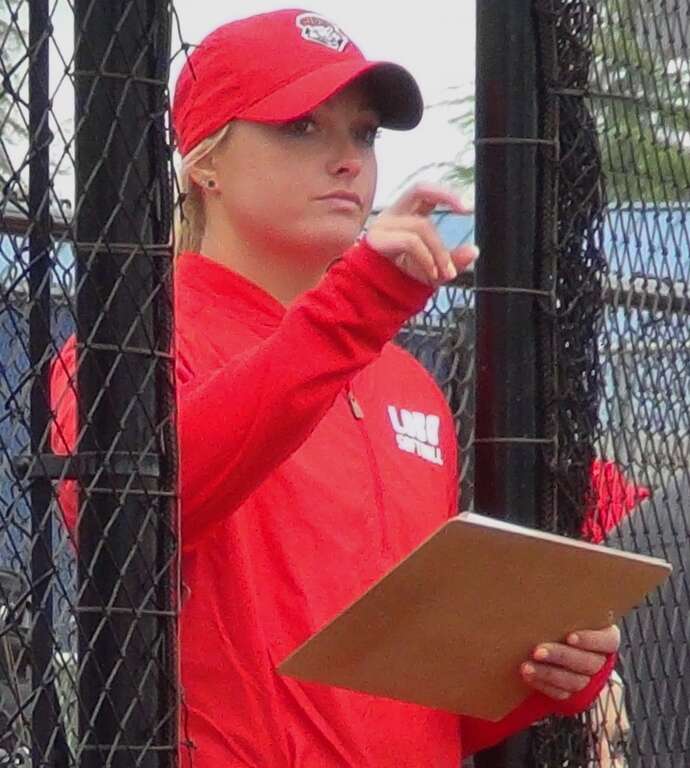 University of New Mexico pitching coach Megan Betsa coaches her team during a game at San Jose State University on April 29, 2018.