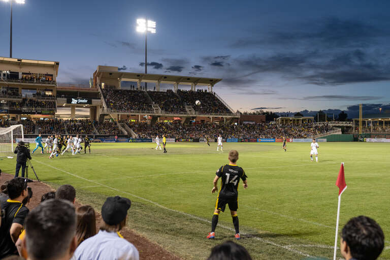 Chris Wehan sends in a corner kick vs. Portland Timbers 2 on April 26, 2019 during New Mexico United's inaugural season
