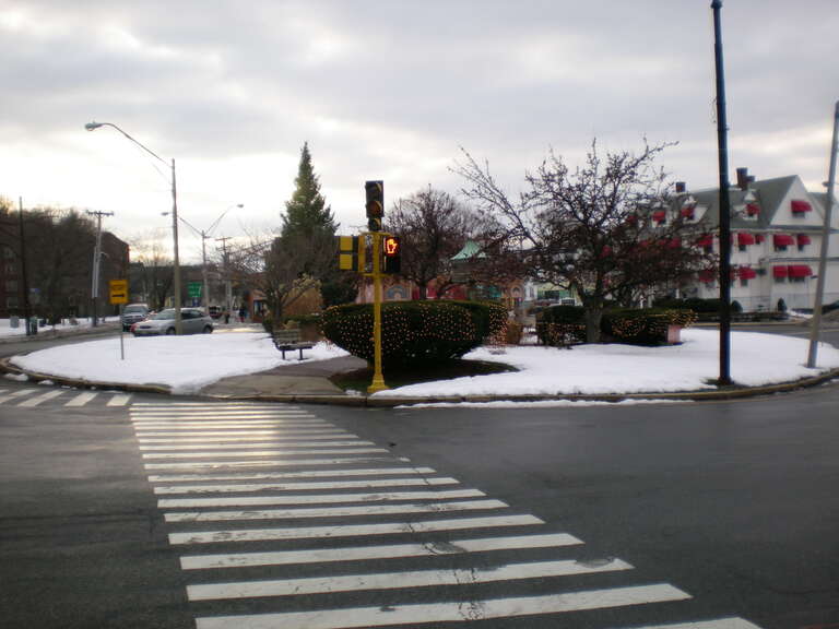 Powder House Square from Warner Street. The Doherty Funeral Home can be seen to the right.
Powder House Square, Somerville, MA