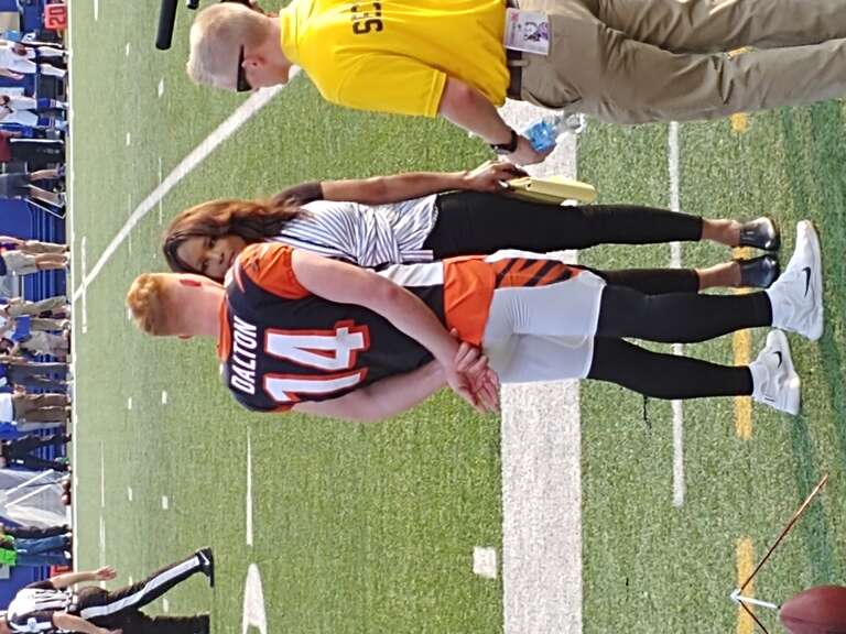 Pam Oliver interviews Bengals QB Andy Dalton during a 2018 preseason game in Buffalo