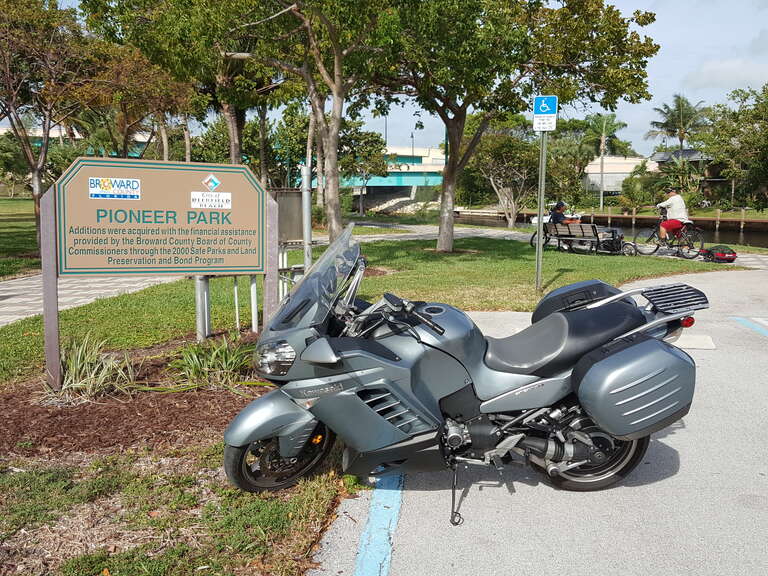 Pioneer Park Deerfield Beach sign with motorcycle