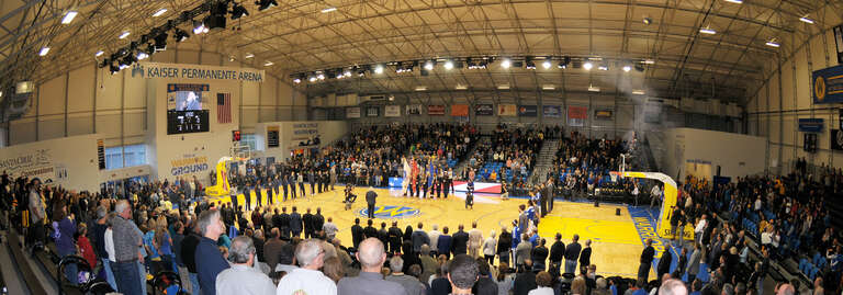 SANTA CRUZ, Calif. --
Military service members of the color guard from the Presidio of Monterey march into position to display the colors during the playing of the national anthem at the Santa Cruz Warriors Basketball Team's Military Appreciation