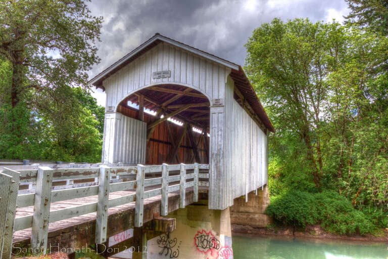 As with other wooden bridges in Oregon, the Stewart Bridge has had its share of woes. Heavy rains of the 1964 &quot;Christmas Flood&quot; brought water raging down Mosby Creek with the resulting force cracking the lower chords of the bridge.
Just over four