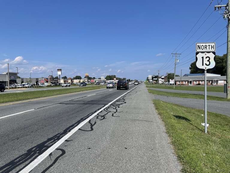 Northbound U.S. Route 13 (Dupont Highway) past the intersection with Voshells Mill Road/Voshells Mill Star Hill Road in Camden, Delaware