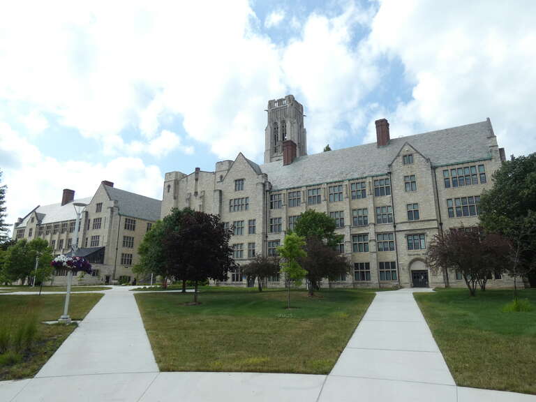 Photo showing the back of University Hall and the clock tower at the University of Toledo.