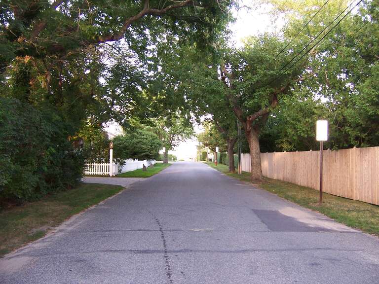 view from rental toward pier and Kennedy Compound

Laughlin Family Hyannis Port Summer House, view from our house toward pier and Kennedy Compound.