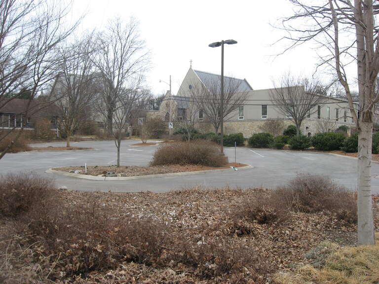 Overview of a parking lot located at 1162 College Street in Bowling Green, Kentucky, United States.  This was formerly the site of the W.H. Blakeley House, which was listed on the National Register of Historic Places in 1979.