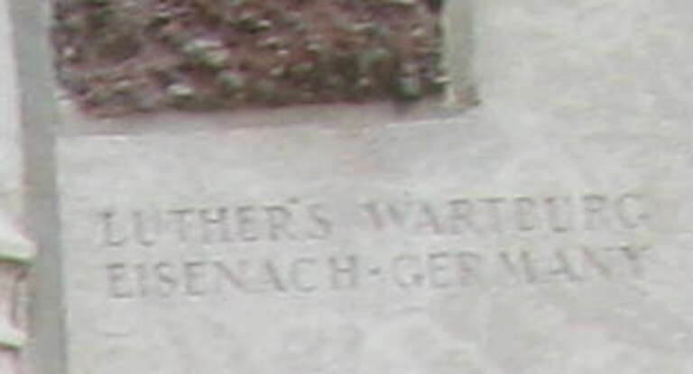 Tribune Tower Wall.  The window has a mock-up of the ivy at Wrigley Field with a poster advertising the Chicago Cubs baseball games on 720 WGN.  Tribune, owners of WGN, also owned the Cubs and Wrigley Field until 2009.  Surrounding the window