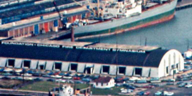 Navy Pier from the Prudential Building.  It was built in 1914-1916, and is about 3,300 ft (1,000 m) long.  When I was young, people said that it was a mile (1.6 km) long.  It was a Chicago city pier, and apparently never an official Navy facility.