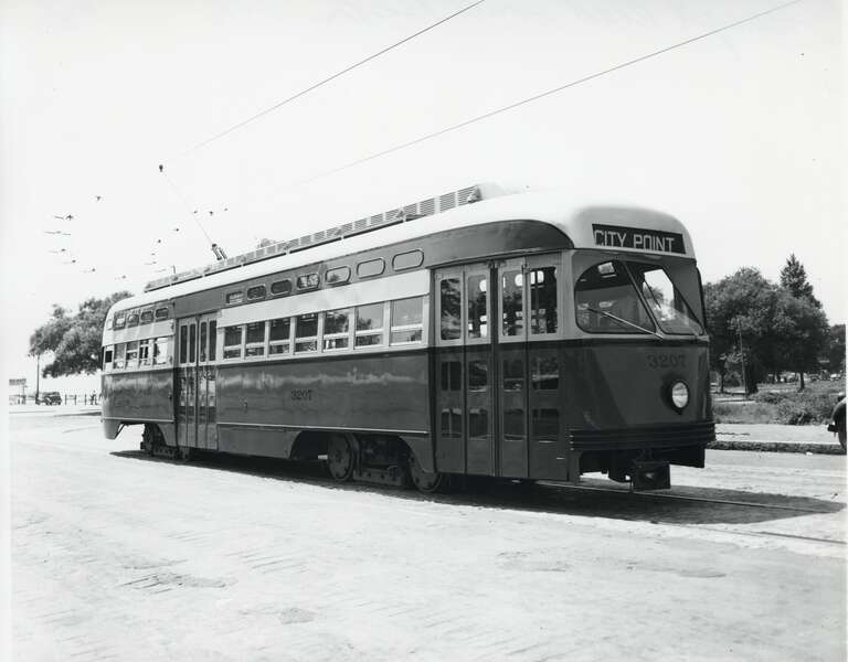A PCC streetcar on route 9 to City Point runs along Farragut Road in South Boston in 1946