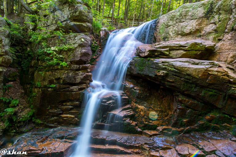 500px provided description: Flume Gorge [#park ,#landscape ,#water ,#nature ,#river ,#travel ,#rock ,#tree ,#motion ,#leaf ,#wood ,#stone ,#waterfall ,#mountain ,#cascade ,#stream ,#outdoors ,#moss ,#wet ,#creek ,#flume ,#flume gorge]