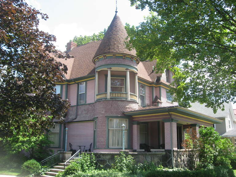 Front and western side of the Frank and Katharine Coppes House, located at 302 E. Market Street (U.S. Route 6) in Nappanee, Indiana, United States.  Built in 1893, it is listed on the National Register of Historic Places, and it is part of a