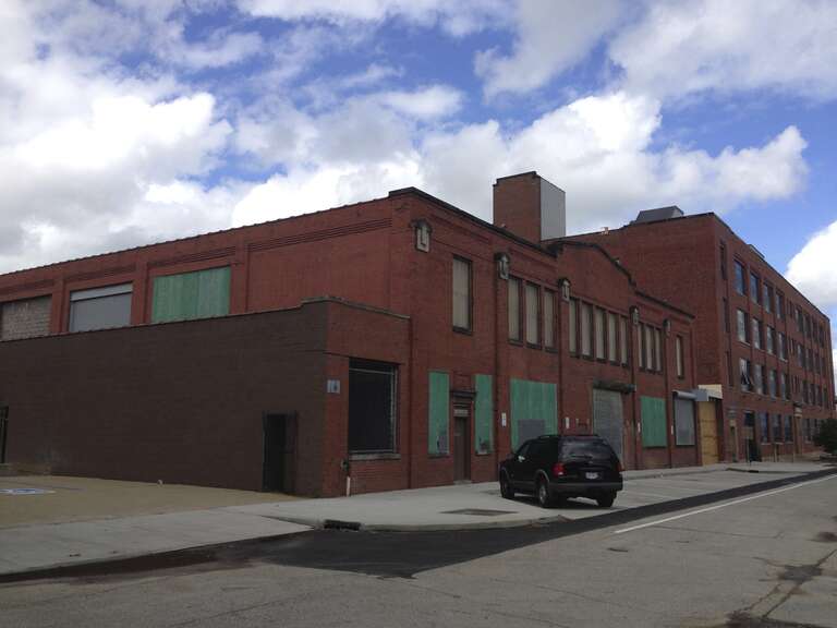Globe Machine and Stamping Company, 1250 W. 76th St,. Cleveland, Ohio. Manufacturers of steel boxes, tumbling barrels. North end of building was divided off (?) and sold to developer for loft apartments (Shoreway Appartments, 1200 W.76th Street.
