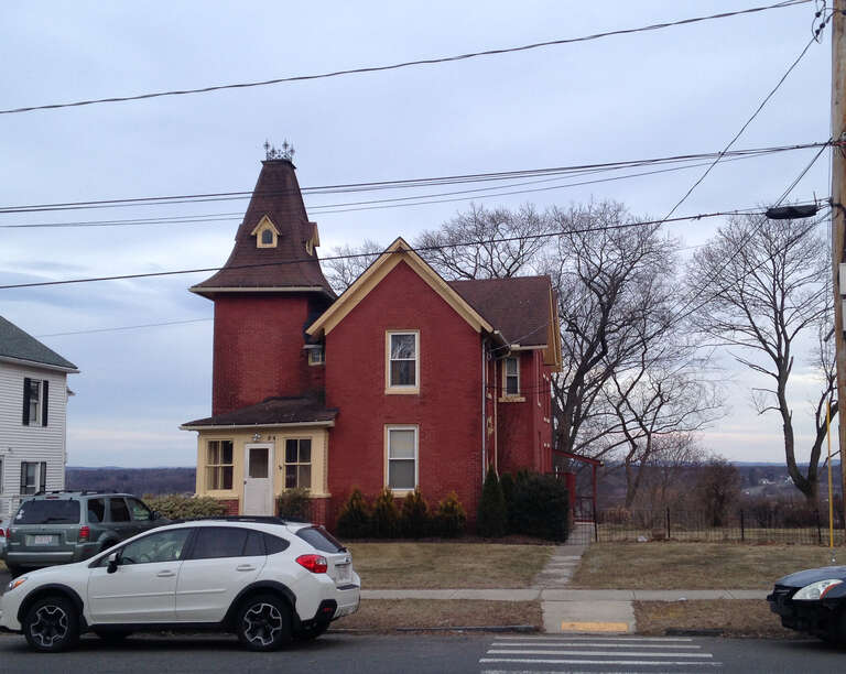 The former residence of John Heinritz, a German-American immigrant from Holyoke, Massachusetts who built and operated Heinritz's Drug Store, now Nueva Esperanza in South Holyoke, and eventually built this Italianate residence in Elmwood sometime