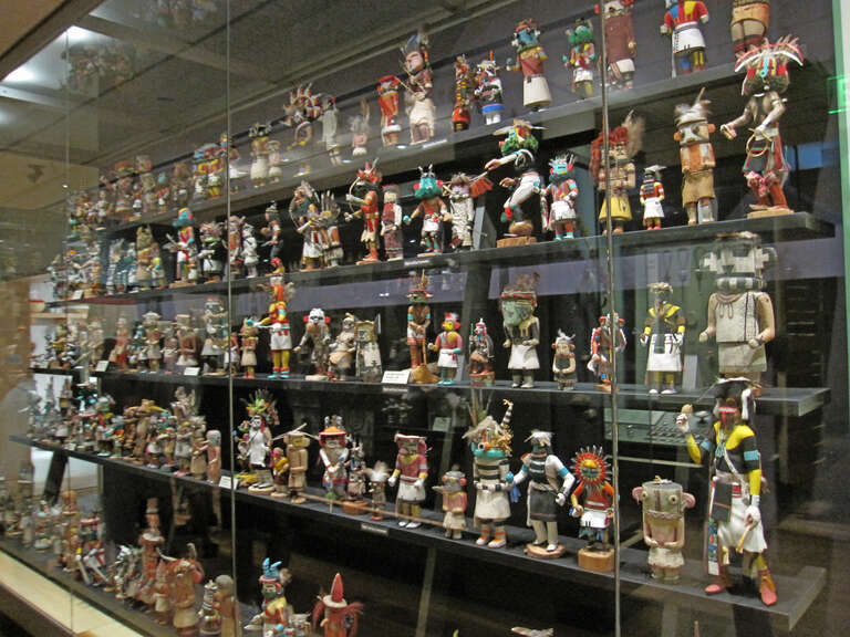 A collection of Katsinas as seen at Heard Museum, which deals with the diverse Native American cultures found throughout Arizona.

Katsinas were spirit messengers in Hopi spirituality, representing all things in the natural world as well as