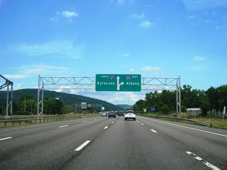 Photo of northbound Interstate 81 in the town of Dickinson, New York approaching its interchange with I-88.