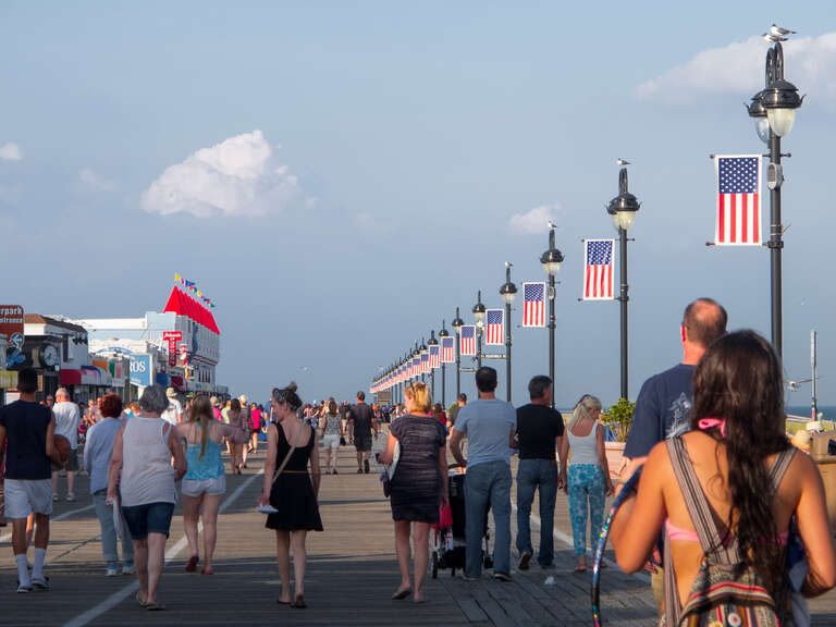 500px provided description: The Boardwalk at Ocean City NJ [#july ,#magic hour ,#g12 ,#Beach ,#New Jersey ,#Ocean City ,#Boardwalk ,#Patriotic ,#Flags]