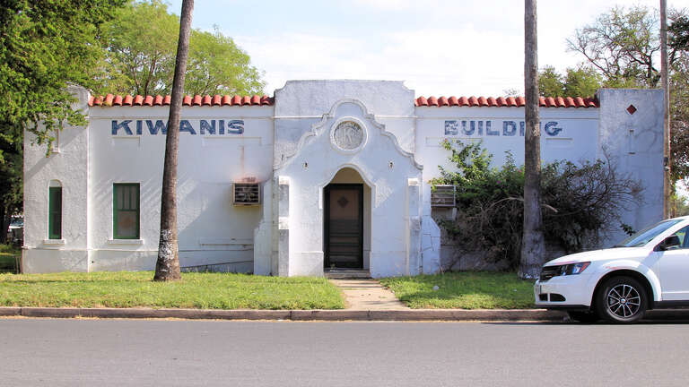 The Kiwanis Club building in Pharr, Texas, United States. It was designated a Recorded Texas Historic Landmark in 1981. Marker text: &quot;This Mission style building was the first meeting place in the Kiwanis International organization owned by a local