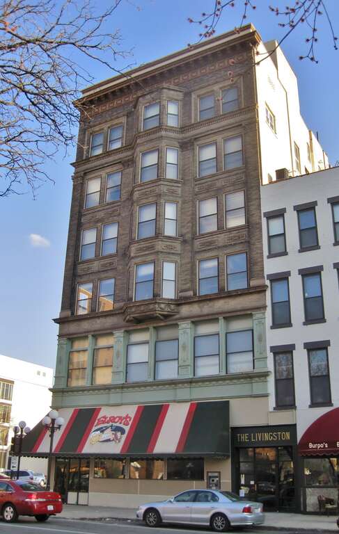 The Livingston Building in the Bloomington Central Business District (c. 1903). It was the first steel-framed skyscraper in downstate Illinois. It was the home of the Livingston &amp;amp; Sons department store for over a decade.  It housed a Walgreens