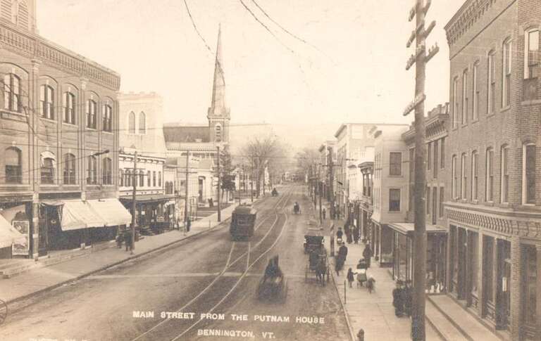 Divided back postcard of Main Street in Bennington with a streetcar, postmarked in 1912