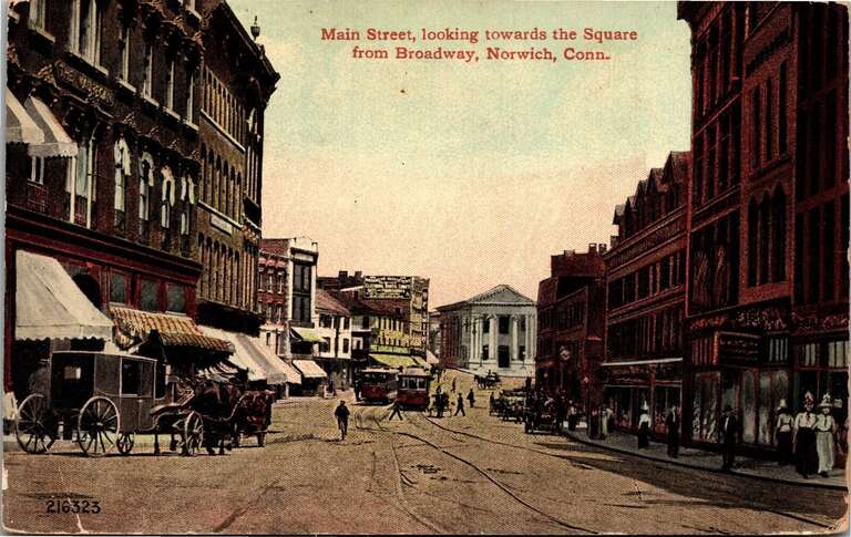 Divided back postcard of Main Street in Norwich, Connecticut, looking east to Franklin Square
