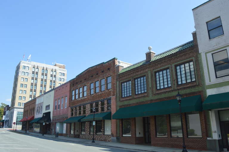 Buildings on the southeastern side of Main Street, between the Davis and Maple intersections, in central Burlington, North Carolina, United States.  This block is part of the Downtown Burlington Historic District, a historic district that is listed