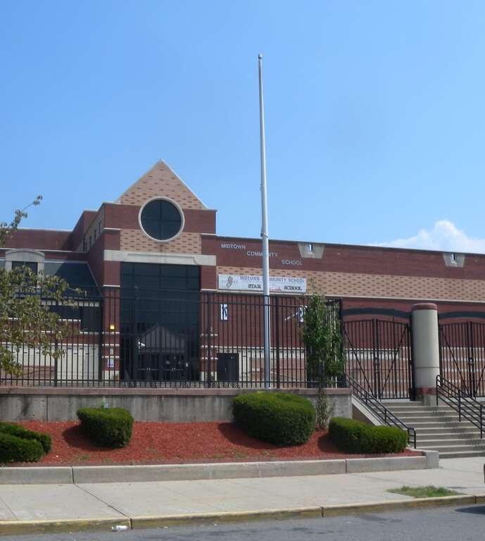 Looking southeast from Ave A at Bayonne Midtown Community School on a sunny early afternoon.