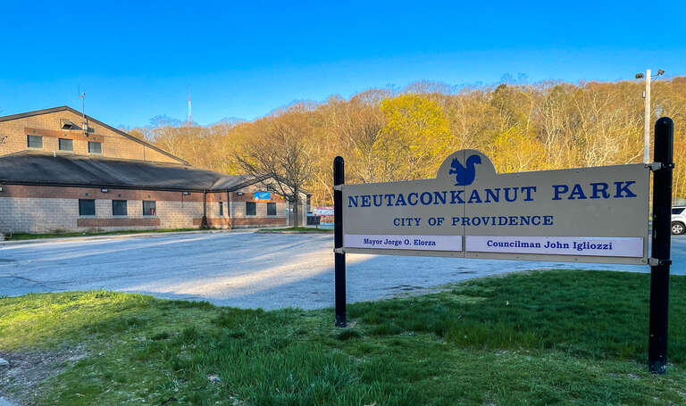 Sign and park building at Neutaconkanut Hill Park, Providence, Rhode Island