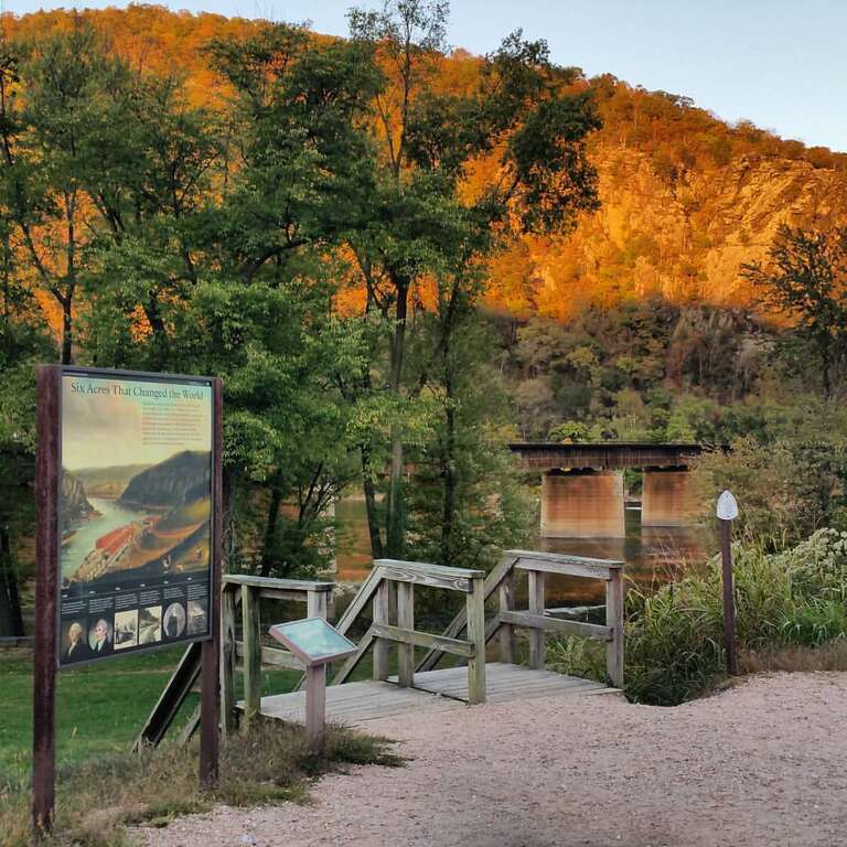 Overlooking the U.S. Armory (Musket Factory) archeology site, at sunset today. We still have lots of green on the heights, but trees in lower town are showing about 30-50% color change. (NPS Photo/Hammer) ~mh
