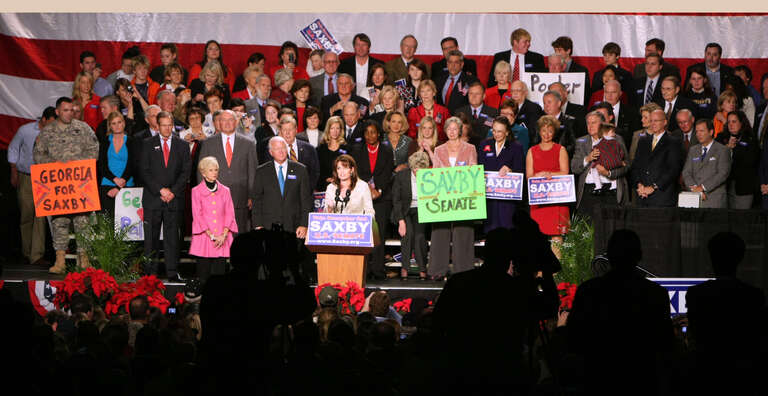 Sarah Palin, Gov of Alaska, helping Saxby Chambliss stay in the US Senate