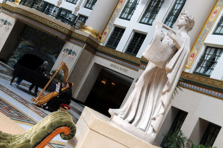 West Baden Resort.  tried to catch the harp player and the statue. 

cloned out some ugly tourists in the background