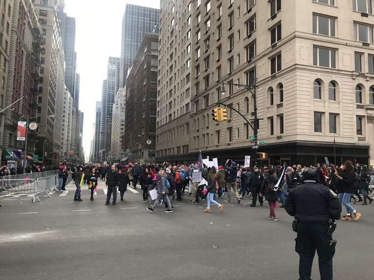 Women march down 6th Avenue in New York City protesting the policies of President Donald Trump and seeking women rights in American
