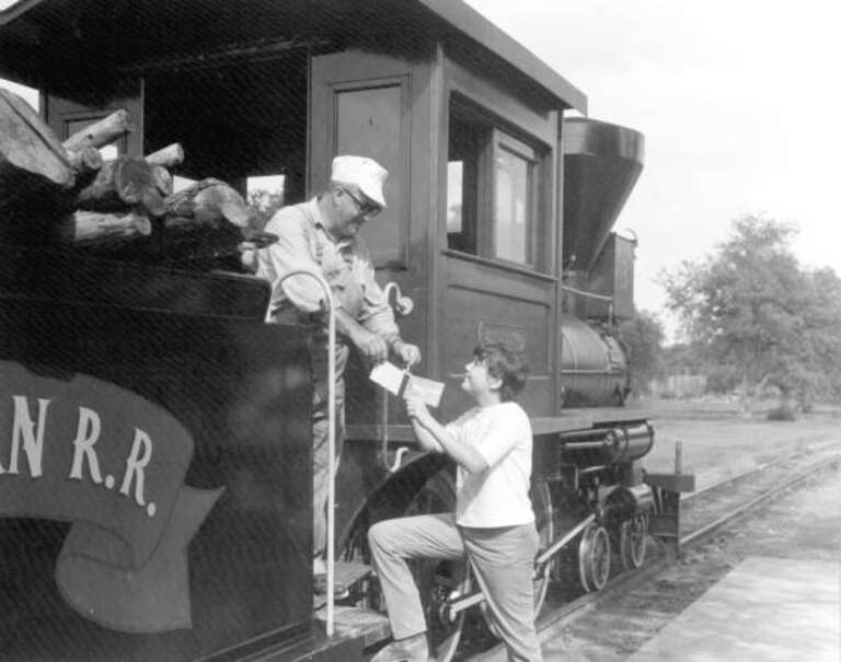 Local call number: c670175Title: Young visitor gets autograph from train engineer at Pioneer City: Davie, FloridaDate: 1967Physical descrip:  1 photoprint; b&amp;amp;w ; 4 x 5 in.Series Title: Department of Commerce collectionGeneral note: Pioneer City