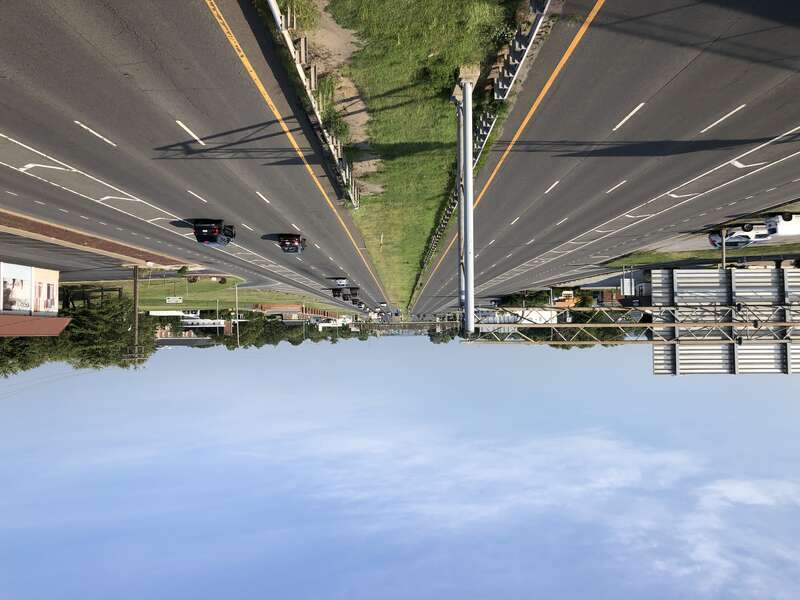 View north along U.S. Route 13 and east along U.S. Route 40 (DuPont Highway) from the overpass for U.S. Route 202 and Delaware State Route 141 (Basin Road) in Wilmington Manor, New Castle County, Delaware