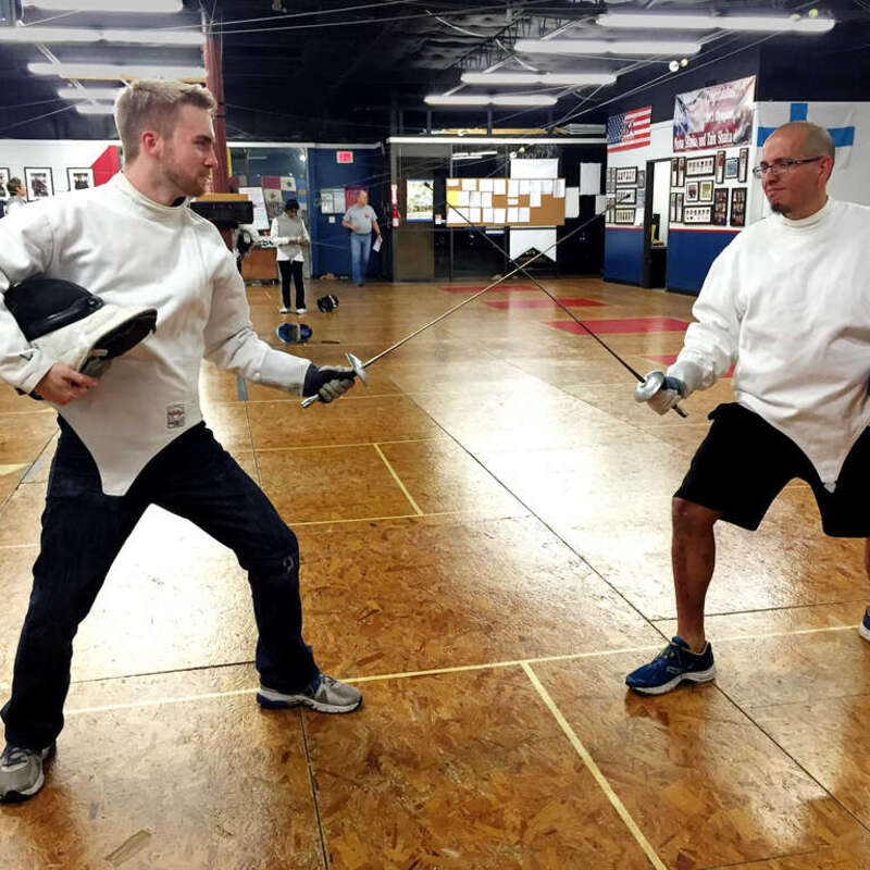 500px provided description: Fencing Partners [#man ,#alpha ,#meeting ,#competition ,#fencing ,#team ,#battle ,#duel ,#injury ,#partners ,#parry ,#discussing ,#co-worker ,#teammate ,#working together ,#dueling]